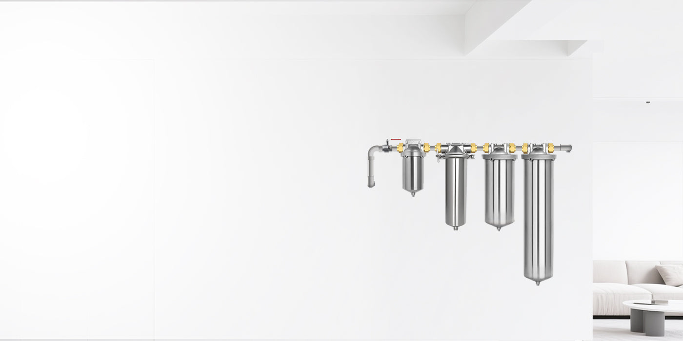 Different sizes of water filter housings on the wall